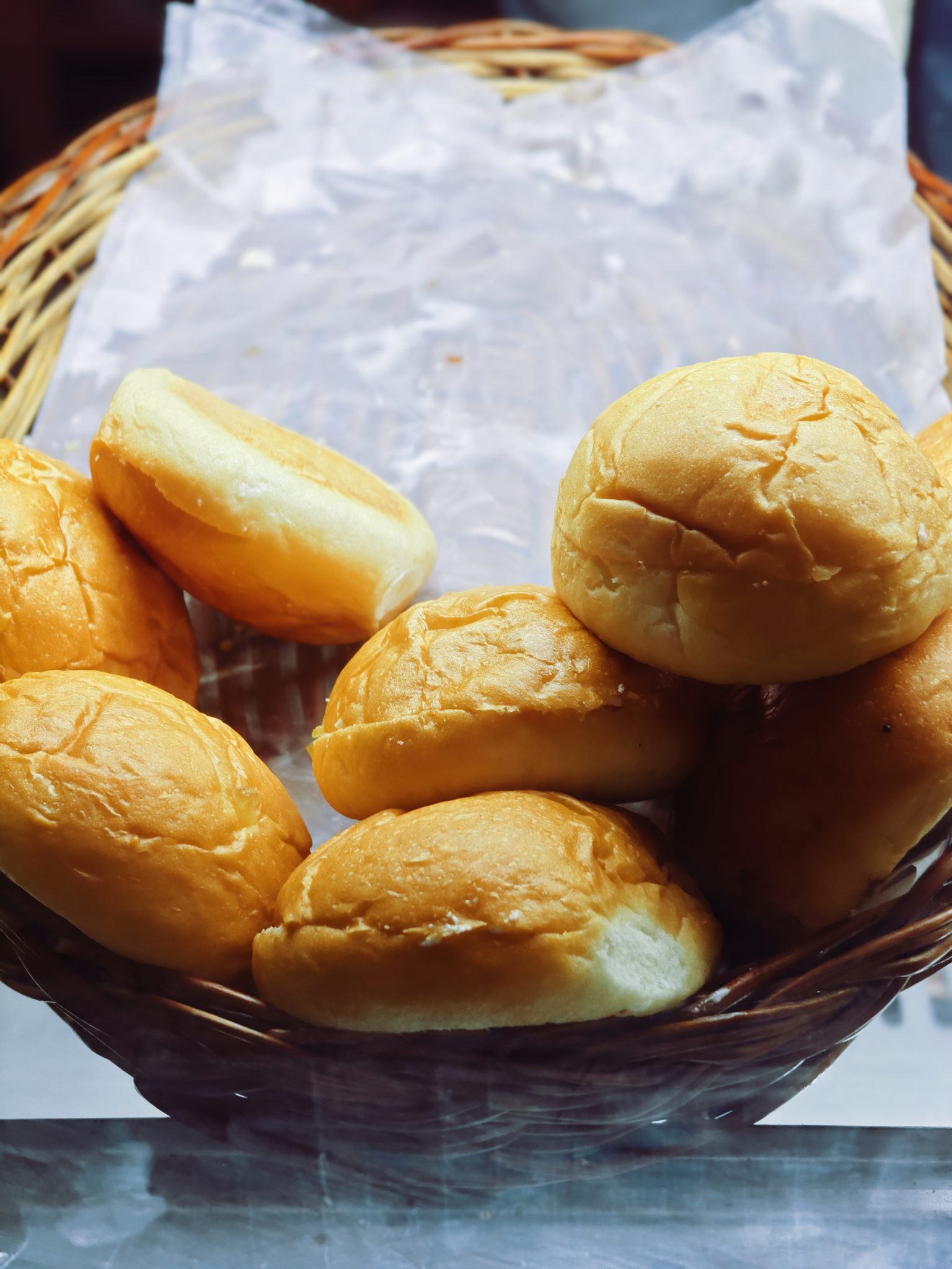 Fresh bread rolls in a basket